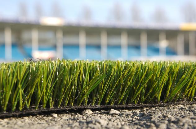 "Skagerak Arena turf" by Rune Mathisen from Skien, Norway - Nytt kunstgressUploaded by Arsenikk. Licensed under CC BY-SA 2.0 via Wikimedia Commons